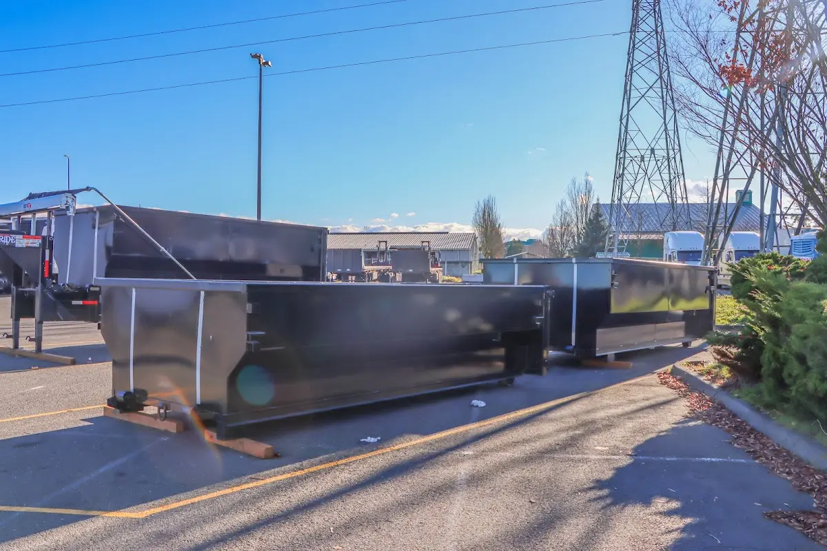 Roll-off dumpster ready for waste disposal at job site for Construction Dumpster Rental in Red Bank
